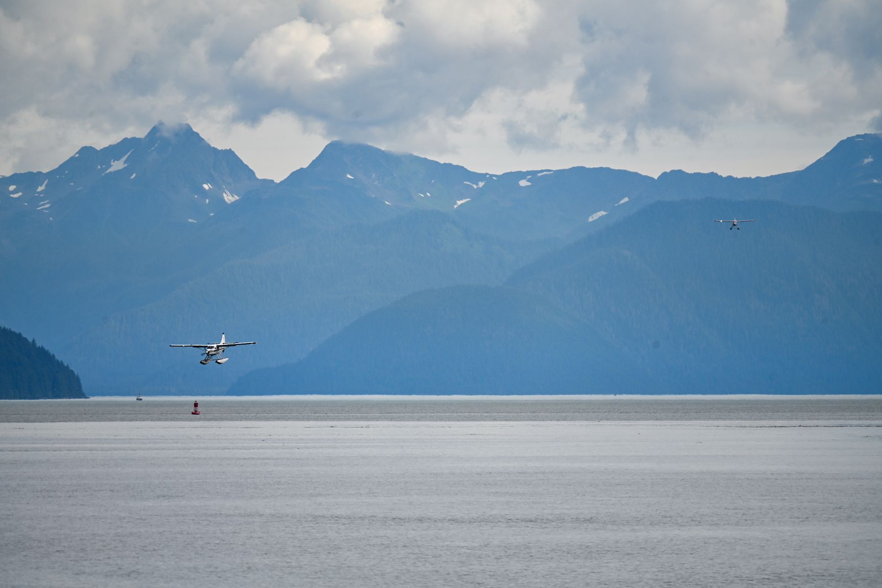 Alaska Travel: Ferry vs Flight Cost Models